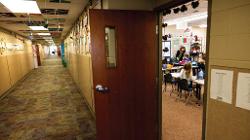 The hallway is quiet as Nicole Brew teaches second graders in her classroom.
