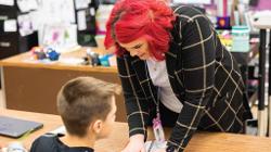 Art Teacher Sara Boom gives instruction at Watford City Middle School. 