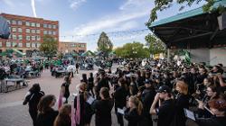 The Pride of the North Marching Band and Spirit Squads gather with UND Fans in Town Square for the Homecoming Pep Rally. 